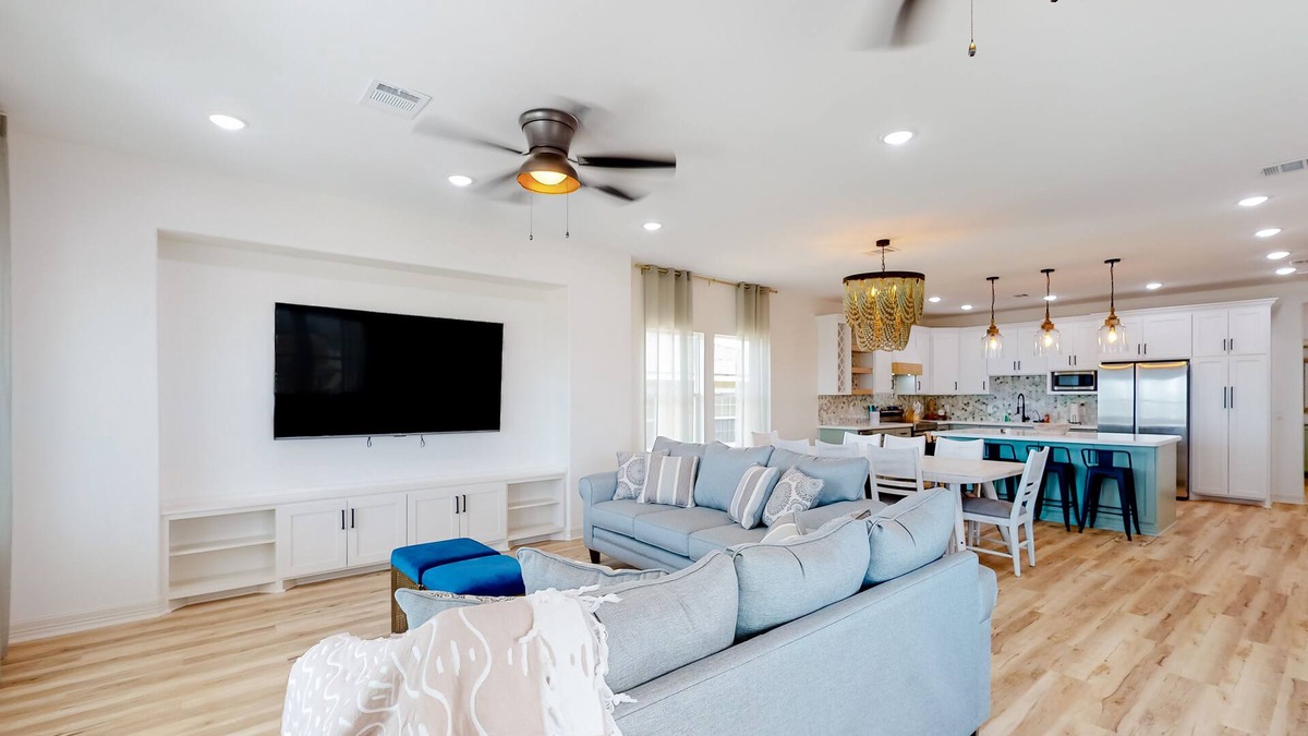 Brand-new home with balconies, games, beach access, W/D, and central AC