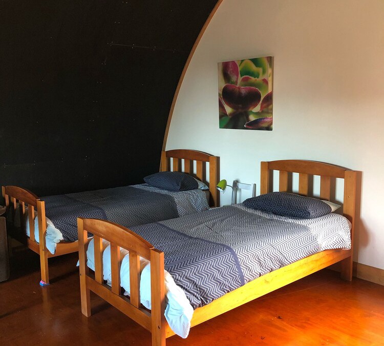 Barnstyle eco lodge - stunning ocean and mt views.