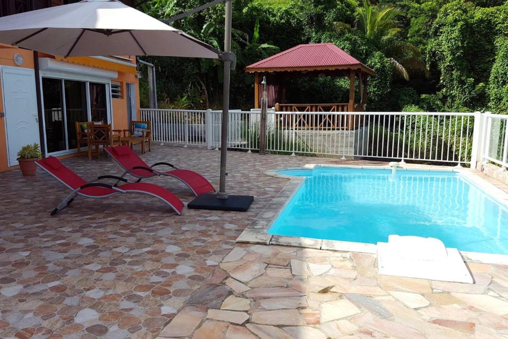 Chambres Vue Sur La Mer Piscine Partagee Et Jardin Clos Bouillante Km Plage | Bouillante