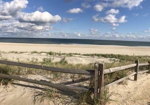 1st Fl of duplex. Sunsets over the bay, walk to beach. Great family getaway.