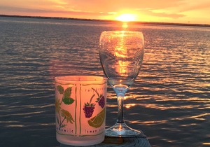 1st Fl of duplex. Sunsets over the bay, walk to beach. Great family getaway.