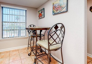 2-story condo with on-site pool & pool views - private balcony & washer/dryer