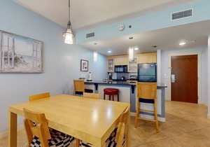 2nd-floor resort condo with balcony, on-site pool, golf, tennis & beach access