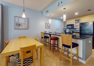 2nd-floor resort condo with balcony, on-site pool, golf, tennis & beach access