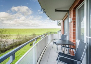 3-room apartment close to the beach with balcony and located directly on the North Sea dike