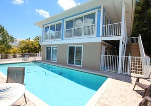 331 Palermo Circle - Chic & cozy beach home with pool and bayfront view!