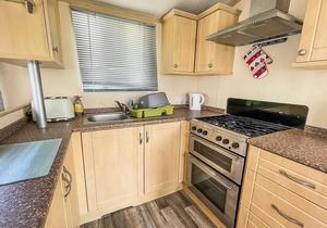 6 berth caravan with decking at Naze Marine Holiday Park ref 17071P