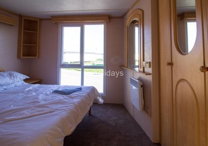 6 berth caravan hire for at St Osyth Beach Holiday Park in Essex ref 28021D