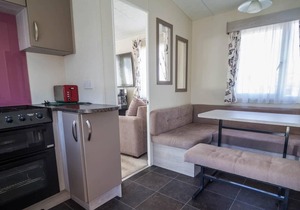 6 berth caravan with decking and WiFi at Suffolk Sands Holiday Park ref 45082C