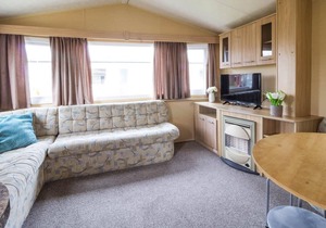 6 berth dog friendly caravan for hire at Martello Beach Holiday Park ref 29096a