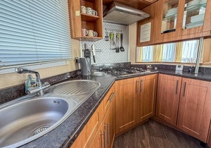 8 berth caravan with decking to hire at Naze Marine in Essex ref 17045NM