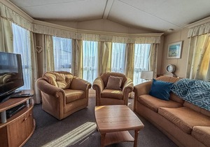 8 berth caravan with decking to hire at Naze Marine in Essex ref 17045NM