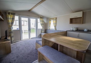 8 berth caravan with decking to hire at Naze Marine in Essex ref 17280C