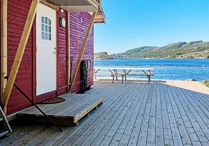 8 person holiday home in Revsnes
