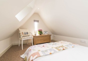 A charming detached stone cottage situated on an elevated site above Upwey.