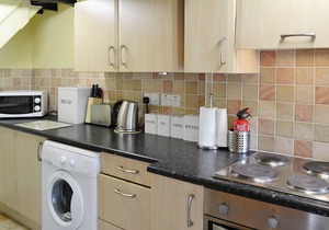 A cosy cottage for four with a wood burner and large, shared garden.