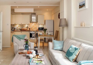 A lovely, modern apartment just 350 yards from the beach.