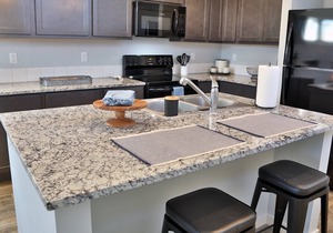 A park-like setting in this BRAND NEW build near the river