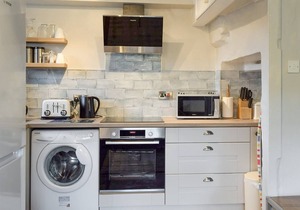 A south facing cottage situated in an elevated position within the traditional Yorkshire Dales villa