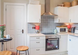 A spacious apartment with stunning views over Gare Loch.