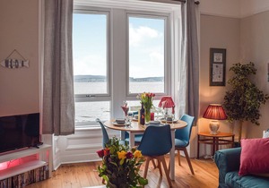 A spacious apartment with stunning views over Gare Loch.
