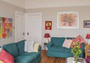 A spacious apartment with stunning views over Gare Loch.