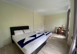 A Spacious Tropical 4 Bedrooms with Bathrooms Villa Marion Tomohon with the view of Gunung Lokon