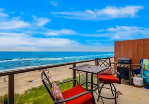 Amazing beachfront condo with deck, patio, & balcony