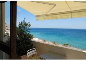 Apartamento frente à praia