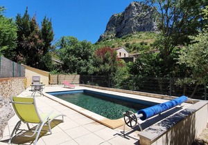 Apartment in village house sleeps 7, garden and pool.