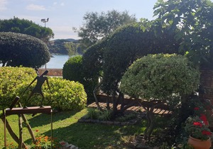 Apartment with garden at 11 meters from the sand beach of la Fosca.
