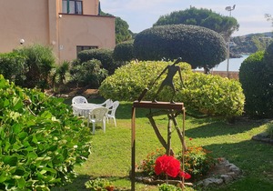 Apartment with garden at 11 meters from the sand beach of la Fosca.