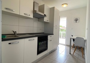 Apartments Roko- Two bedroom apartment with balcony and garden view (B4)