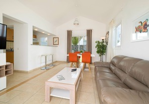 B1, in a small complex with communal heated pool 100m from the sea