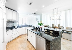 Beachfront 10th-floor condo with Gulf view, pool, gym, & balcony