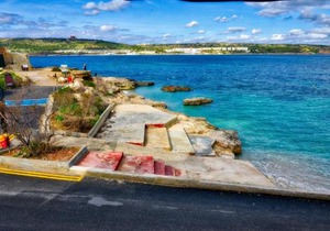 BEACHFRONT with Seaviews Apartment No56 Award Winner Unbeatable Location for Closeness to the Sea Ideal for Guests looking for Winter Spring and Autumn Breaks in Sunny Malta Also Ideal for Coastal Hikers