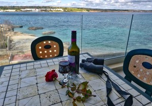 BEACHFRONT with Seaviews Apartment No56 Award Winner Unbeatable Location for Closeness to the Sea Ideal for Guests looking for Winter Spring and Autumn Breaks in Sunny Malta Also Ideal for Coastal Hikers