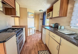Beautiful 6 berth caravan for hire with huge decking at Manor Park ref 23142K
