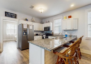 Beautiful home in a gated community w/porches & shared pool/hot tub