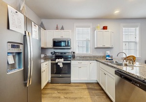 Beautiful home in a gated community w/porches & shared pool/hot tub