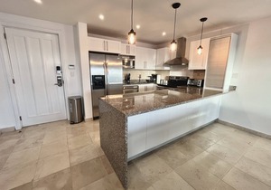Beautiful top floor beach front condo in the center of cap cana.