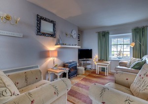 Beautifully decorated, homely yet spacious apartment looking out onto the harbour of the much loved