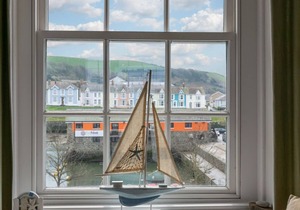 Beautifully decorated, homely yet spacious apartment looking out onto the harbour of the much loved