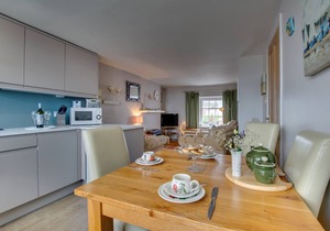 Beautifully decorated, homely yet spacious apartment looking out onto the harbour of the much loved