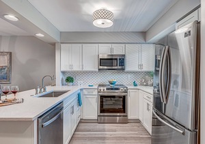 Beautifully Renovated 2 BR Villa! Neighborhood Pool! Amenity Cards Included!