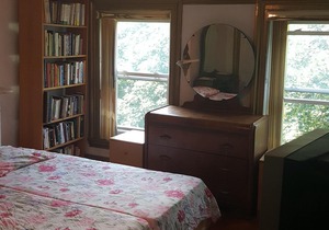 BEDROOM # 2 WITH AN EVENT SPACE AND BACK PORCH
