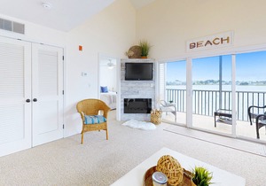 Bethany Bay Condo Overlooking Water with Shared Pool, Private W/D, & WiFi