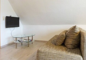 "Between the Baltic Sea beach and the Bodden, the Boddenhus apartment house awaits you with its brig