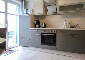 "Between the Baltic Sea beach and the Bodden, the Boddenhus apartment house awaits you with its brig