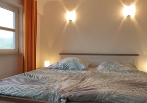 Between the Baltic Sea beach and the Bodden, the Boddenhus apartment house awaits you with its brigh